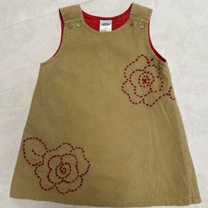 Old Navy girls tan corduroy jumper with red roses, size 12-18m.
